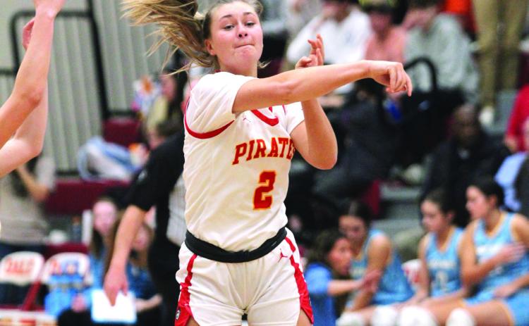 Dale senior Heartly Snyder passes during the Class 2A Regional home game with Oktaha on Feb. 24. The Lady Pirates won, 77-50, and they will advance to area in McAlester on Feb. 28 at 6 pm. Countywide & Sun/Natasha Dunagan