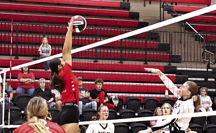 North Rock Creek’s Mya Wong stretches for the block. Photo courtesy of Gowin Photography