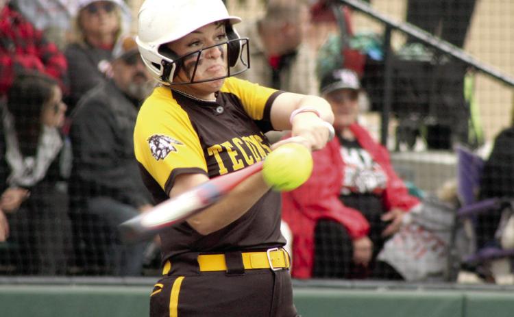 Tecumseh senior Abbi Jordan gets a hit during the Class 5A Slow Pitch Quarterfinal game against Elgin, held at FireLake Ball Fields on May 5. The Lady Savages lost, 5-15, and end their season with a record of 28-13.