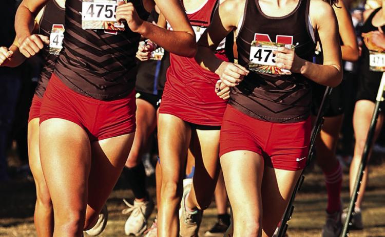 North Rock Creek’s Cross Country girls team qualified for the state championship. Pictured above are Abby Bloyed and Jaynie Ford as they compete in the Regional meet.