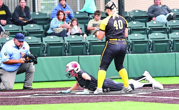 The NRC softball team took on Tecumseh at Firelake. NRC won 5-0. Sophie Morris slides safely home. Photo Courtesy of Gowin Photography