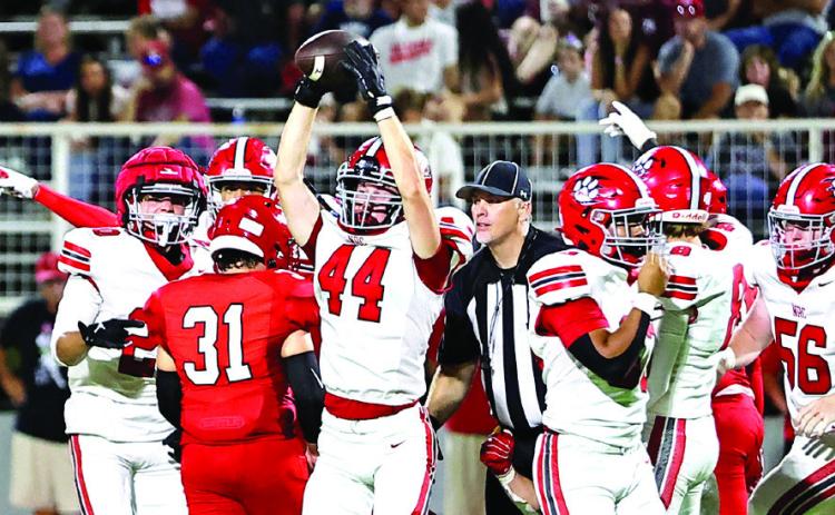 NRC's Trip Swan celebrates after recovering a Prague fumble on Sept. 12. Friday, NRC will host Holdenville for their first home game of the season on their new turf field.