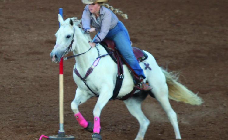 Josey Milburn of Asher competes in Pole Bending during the International Finals Youth Rodeo on the evening of July 7. Natasha Dunagan, Countywide &amp; Sun