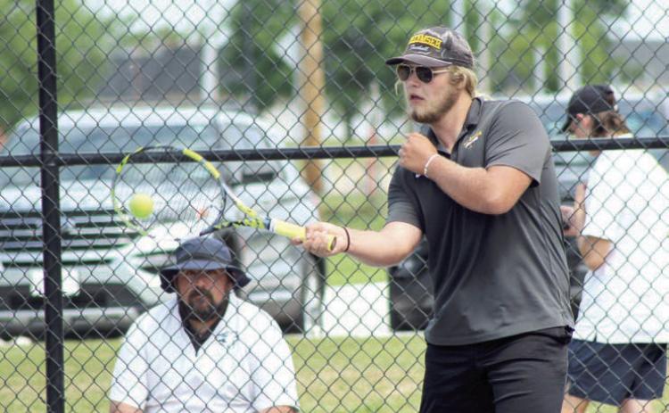 Tecumseh senior Ted Belshe meets the ball with a forehand stroke during the Shawnee NGB Tournament, held at SHS and OBU on May 2. Belshe placed sixth in #1 Singles. There were 16 teams in the tournament. Natasha Dunagan, Countywide &amp; Sun