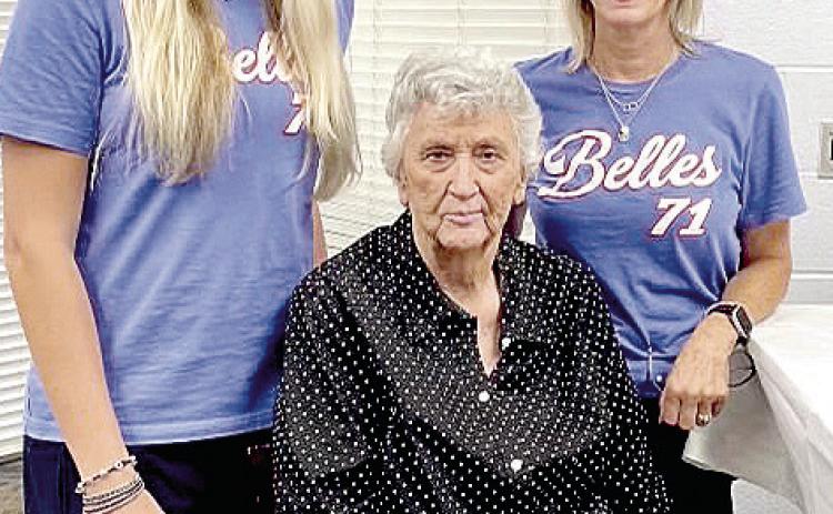 Former Belles Head Coach Dixie Woodall (center) was recently interviewed for the docuseries If Not for Them. Pictured alongside Woodall are current Belles Head Coach Rita Story-Schell (right) and Belles Assistant Coach Jentry Holt (left). Photo provided