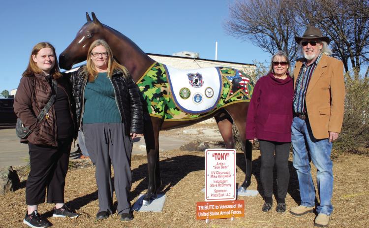 Artist Sue Bear, second from left, with her daughter Janie Lynn Johnson, and Dana and David Taylor, the owners of the Plaza East Labyrinth Office Park, at 722 E. Independence in Shawnee, pose with Tony, the latest “Horse in the City,” on Jan. 16. Tony is a tribute to the Veterans of the United States Armed Forces and has been a work in progress for about three years. Countywide & Sun/Natasha Dunagan