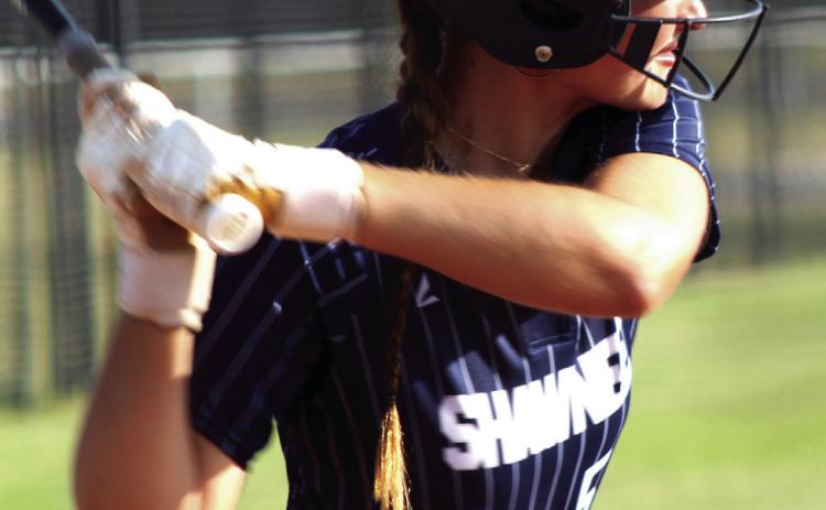 Shawnee senior Taylor Bailey prepares for a hit at bat during the Sept. 24 Senior NIght home game against Del City. Bailey also sang the national anthem to kick off the game.