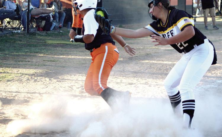 After sliding across home, the Roff pitcher still tries to tag Maud’s Amerikus Street during the home game on Sept. 15. Maud lost that game, which went into extended innings, 4-5, but they won an earlier game that day with Paden, 14-0. Countywide &amp; Sun/Natasha Dunagan
