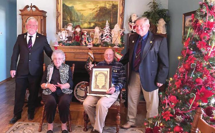 Raymond Talley, formerly of Tecumseh, accepts his 75-Year Masonic Service Certificate and Pin at his Stillwater home in Dec. Shown, from left, are Oklahoma’s Grand Master M.W. Scott Vincent, Myrna Talley, Raymond Talley, and Oklahoma’s Grand Warden R.W. James Roderick. Photo provided by Susan Cockrell.