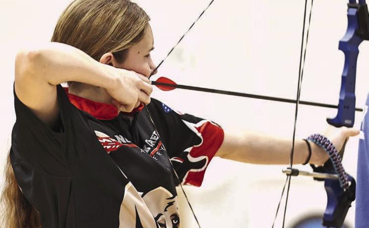 Kadence Munn takes aim and also shoots a 279, finishing 5th in overall girls at the Meeker Archery Annual Turkey Tourney on Nov. 14-15.