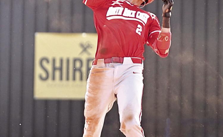 North Rock Creek’s Owen Payne celebrates his double. NRC baseball team took on the Tecumseh Savages Tuesday, June 18, in the summer league. NRC won both games, varsity 14-2 and JV 14-9.