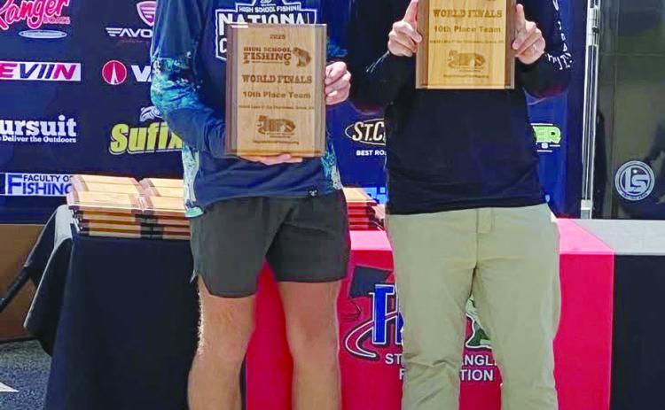 Riley Motrych and Vincent Weltzheimer pose with their 10th-Place World Finals High School Fishing plaques.