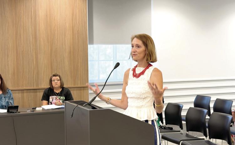 Rachael Geiger with the OKC Philharmonic answers questions from the Commissioners at the meeting held Tuesday, Aug. 11. Commissioners approved a $35,000 sponsorship, for the Christmas concert to be heald at The Grand on Dec. 7. Suzie Campbell, Countywide &amp; Sun