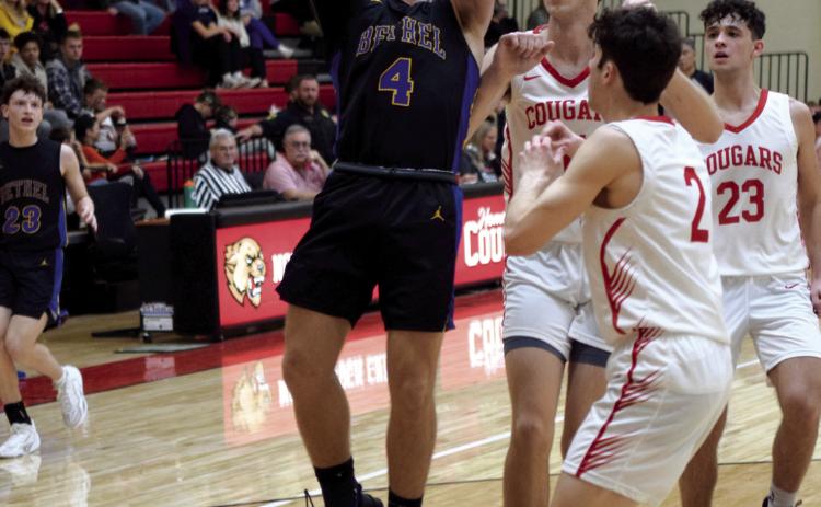 Bethel’s R.J. Morris shoots for two during the game against NRC on Jan. 12. The Wildcats fell short of the win with a score of 57-68. Countywide & Sun/Julie Talton