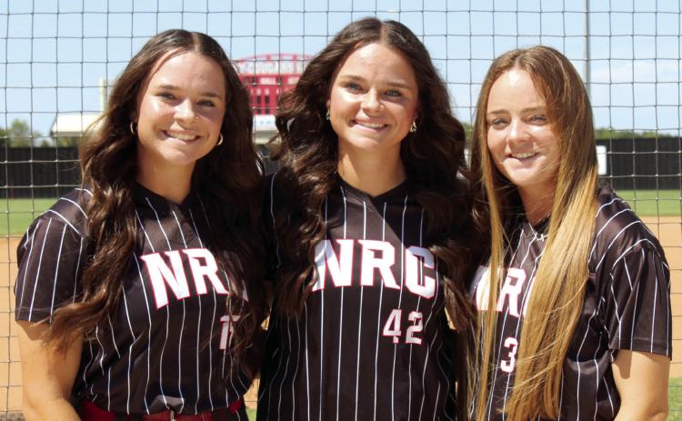 Triplets Morgan Campbell, Sarah Campbell and Molly Campbell are the only seniors on the North Rock Creek Lady Cougars Fast Pitch Team this season. They are shown here posing during the NRC Media Day on Aug. 16. Countywide &amp; Sun/Natasha Dunagan