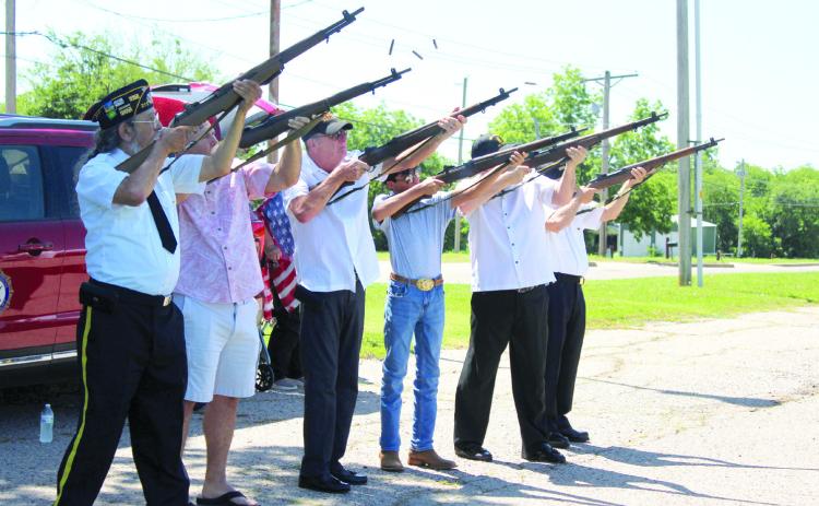 An honor guard led by members of the American Legion Post 260 gives an 18-gun salute during the Memorial Day service at Tecumseh Cemetery on May 27. There were also wreaths placed for each military branch and the emergency responders. Rev. Paul Fletcher, with Northridge Church of Christ in Shawnee, and State Senator Shane Jett spoke, as well as Post Adjutant Bill Gammage. Shown, from left, are Gammage, Fletcher, Vice Commander Alynn Stewart, Abraham Seper, CSM George Seper and Chaplain Stuart Rose.