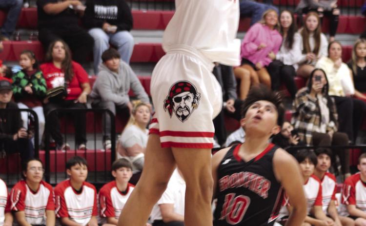 Dale's Jerimiah Skaggs sinks a slam dunk during the Nov. 21 Pink Out home game against Frontier. The Pirates won 88-47. Natasha Dunagan, Countywide &amp; Sun
