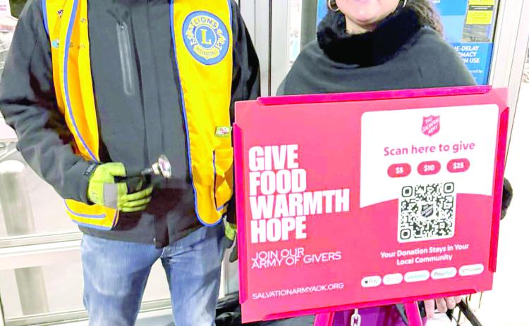 Clay Dodgion, with wife Jamie, supports The Salvation Army by volunteering as bell ringers. Photo provided