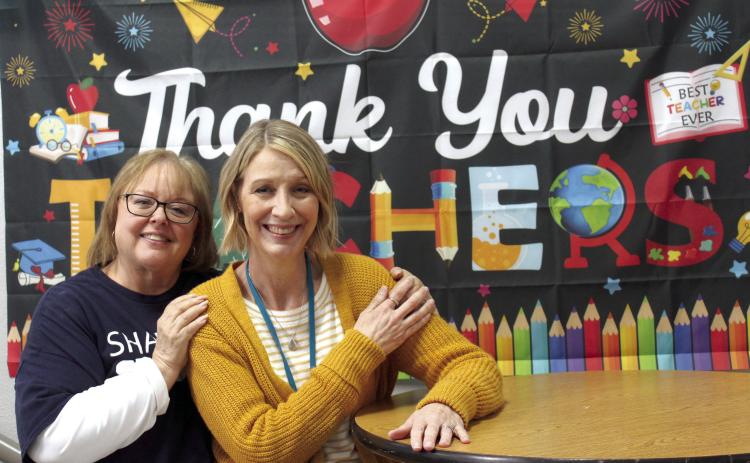 Jim Thorpe Academy Principal Debra Watson and JTA Science Teacher Melisa King pose in front of a sign that reads, “Thank you, Teachers!” on May 14. Watson is retiring after 49 years in education, and King was named the Shawnee Public Schools District Teacher of the Year. Countywide &amp; Sun/Natasha Dunagan