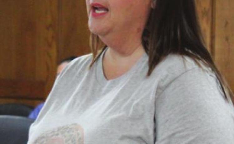 New Will Rogers Elementary Principal Molly Wilson speaks to the Shawnee Board of Education and Superintendent Dr. April Grace after being introduced during the Aug. 1 meeting. Countywide &amp; Sun/Natasha Dunagan