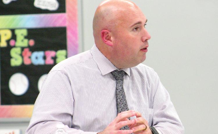 Tecumseh School Superintendent Robert Kinsey presents information to the Tecumseh Board of Education during Monday night’s meeting. Countywide &amp; Sun/Kendra Johnson