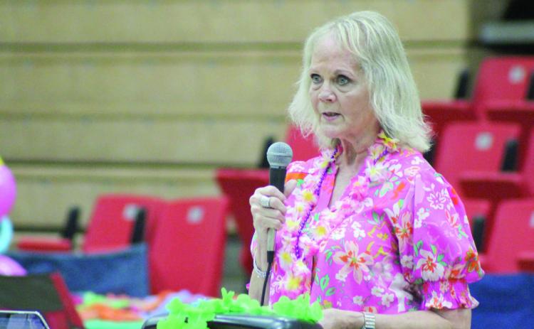 Relay for Life Guest Speaker Cindy Hale talks about skin cancer during the “Re-Lei for a Cure” event on April 26. Hale said her skin cancer started with a spot on her nose.