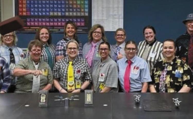 Teachers and staff at Tecumseh High School dressed like the late Merle Hunsaker, Jr. - a longtime science teacher who dressed in dress shirts, wild ties, glasses and ponytail - and one of them threw a rubber brick. This photo was taken during the Battle of the Buildings, a competition which happens at the end of the school year. Photo courtesy of Iva Bingham.