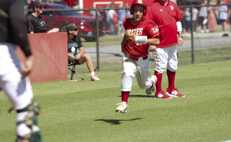 Dale junior Kam Wilson runs home in the second inning of the Sept. 5 Tushka game during the Asher Festival of Champions baseball tournament. The Pirates won that game, 10-2, and the game with Calumet on Sept. 6, 9-1. Games were played at Dale and Asher with eight other teams from across the area. Countywide & Sun/ Natasha Dunagan