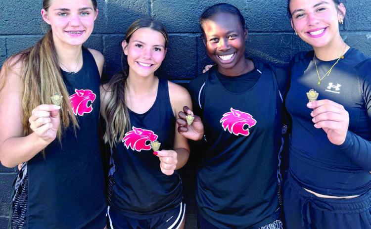 The Lady Wildcats 4x100 Relay team of (pictured from left) Xalina McCarroll (JR), Payten Gentry (SO), Zeaonna McGregor (FR), and Lilly Gentry (FR) finished 6th at Regionals. The Lady Wildcats set a new team record and narrowly missed qualifying state by 500ths of a second with a time of 54.9. Photo courtesy of Earlsboro Track Coach Tim Gentry