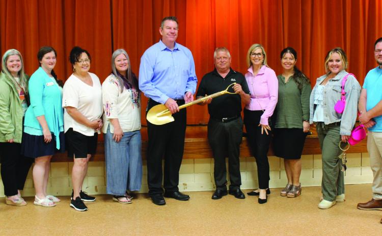 Dobson Fiber, out of OKC, held a groundbreaking ceremony at Tecumseh City Hall Auditorium on May 16. They were represented by Chief Strategy Officer Jim Horsburgh, center left holding shovel with Tecumseh City Manager Jimmie Stokes; Director of Business Operations Heather Durham, third from right; and Director of Marketing Ali Clark (not shown), who spoke at the event. Dobson Fiber is currently laying lines throughout Tecumseh in order to offer residential service. They already offer business service.