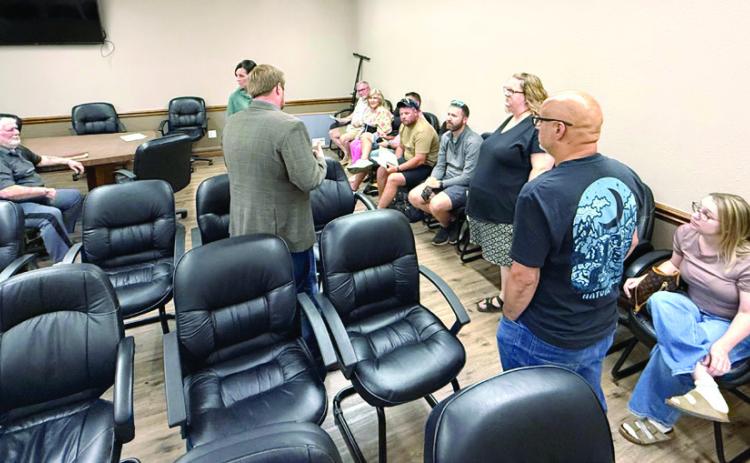 McLoud City Manager Cody Roe spoke to residents of the Meadowridge subdivision about possible options for their road. Julie Talton, Countywide & Sun
