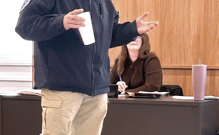 Tecumseh Police Chief J.R. Kidney addresses attendees of the Jan. 7 County Commissioners meeting about security measures for the IFYR. Countywide &amp; Sun/Suzie Campbell