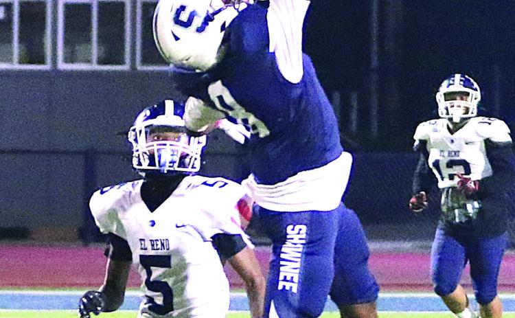 SHS receiver Brendon Johnson goes up high on a reception attempt against El Reno in the Wolves’ 49-20 win. Photo courtesy of Kent Bush