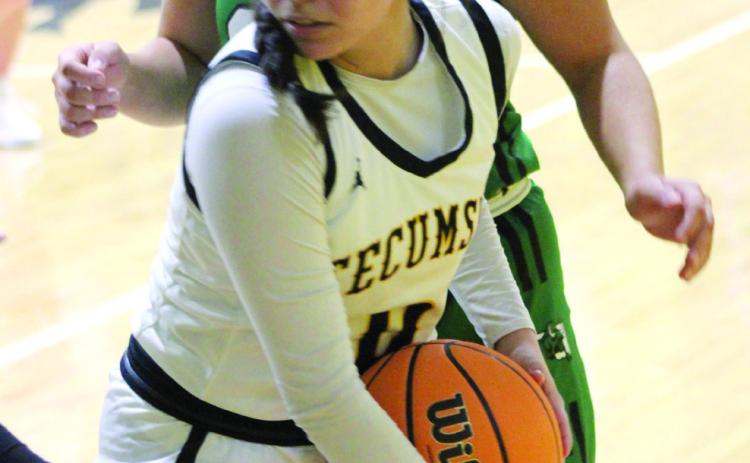 Tecumseh’s Jadyn Wilson guards the ball from a Jones defender during the Jan. 9 home game.