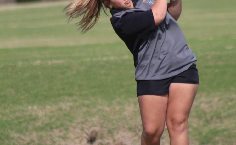 Paige Lowther drives at the Tecumseh Girls Golf Tournament on April 19.