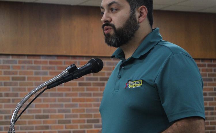 Victor Leo Reyes, co-owner of Taco Boy Taqueria, speaks about the semi trucks that have been turning around in their parking lot during the Tecumseh City Council Meeting on July 5. Reyes was also granted a Conditional Use Permit to sell beer and wine. Countywide & Sun/Natasha Dunagan