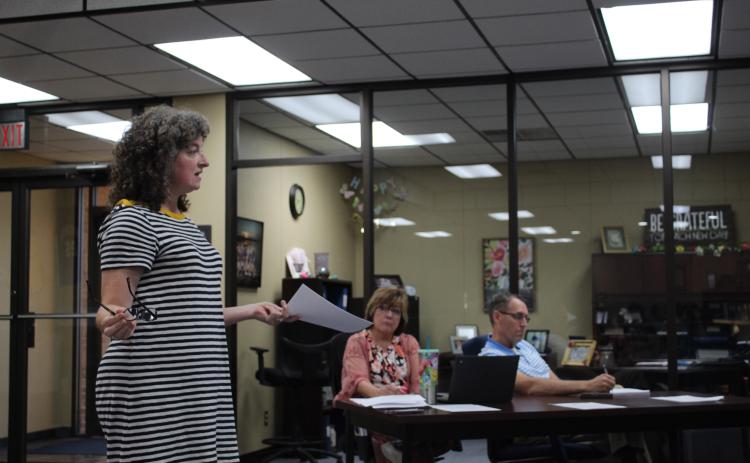 Bethel Teacher Alicia Gardner speaks to the Bethel Board of Education during the meeting on Aug. 8, as Minutes Clerk Denise Flowers and Superintendent Dr. Matt Posey listen. Countywide & Sun/Natasha Dunagan