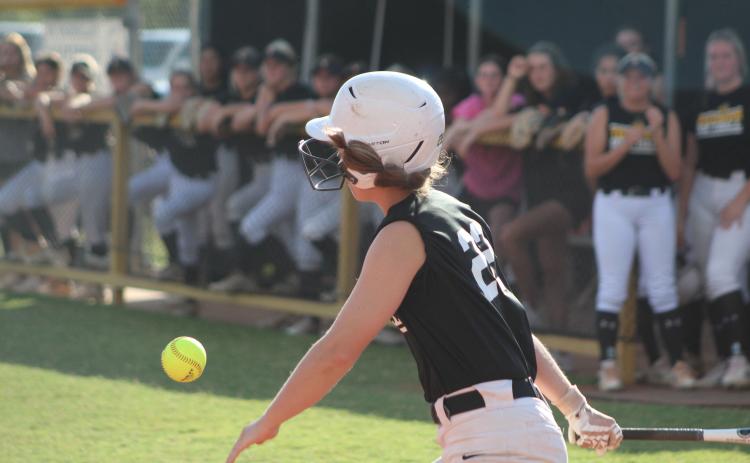 Tecumseh's Jessi Hull hits a sacrifice fly in the third inning of the home game against McLoud on Sept. 19. The Lady Savages won 12-0. Countywide & Sun/Natasha Dunagan