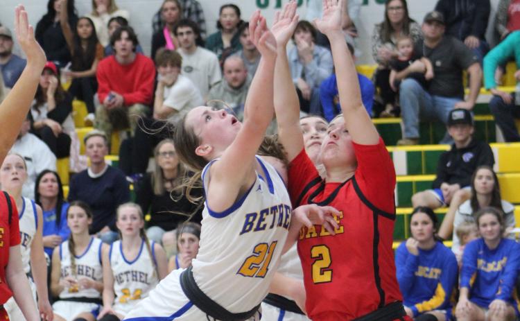 Bethel's Josie Megehee puts up a shot, as Dale's Makenzy Herman defends the basket, during the Bethel home game, held at OBU on Jan. 17. The Dale Lady Pirates won 43-39. Countywide & Sun/Natasha Dunagan