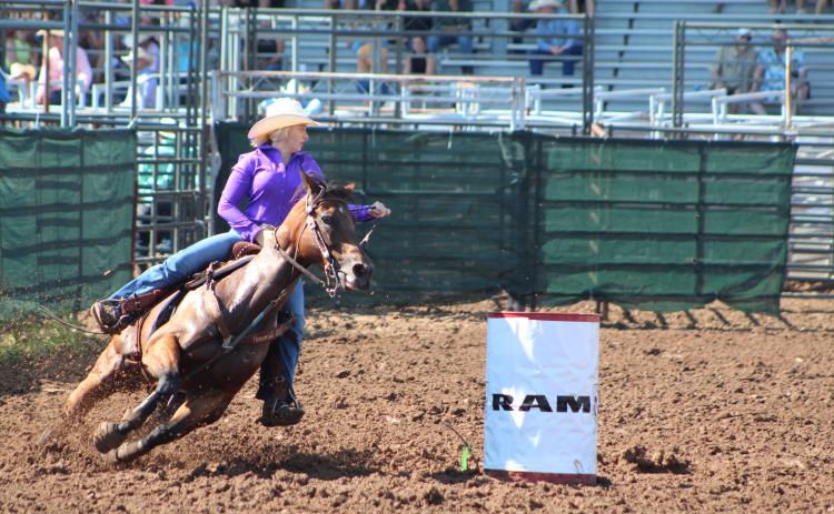 Matraya Haynes of Maud rounds the second barrel in the Barrel Racing event of the International Finals Youth Rodeo on the morning of July 10. Countywide & Sun/Natasha Dunagan