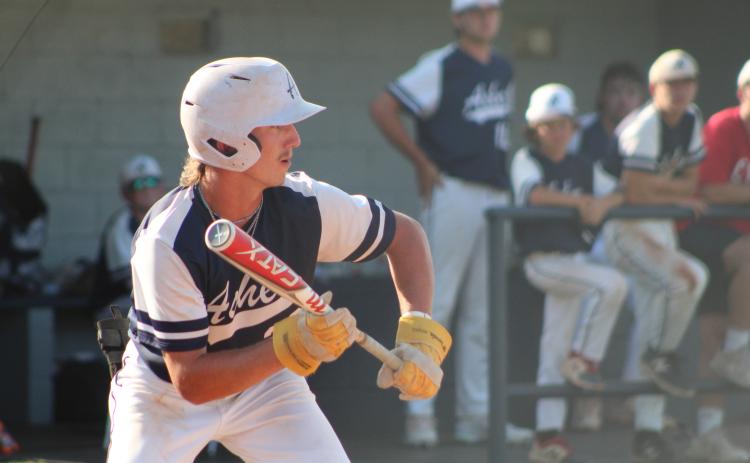 Asher junior Raygan Kuhlman tries for a bunt in the fourth inning of the Sept. 5 game with Byng. The Indians lost, 2-7. Countywide & Sun/Natasha Dunagan