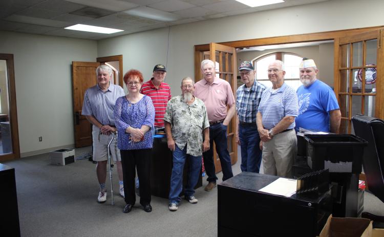 Members of the Shawnee Veterans Memorial Committee and a few others toured the former Shawnee Carnegie Library - and most recently District Attorney's Office - on Sept. 5 in consideration of turning it into a Veterans Museum. Shown, from left, are Gordon Richards, Jr., Barbara White, Al Brase, James Bryce, Price, Bob Winchell, Ford and James Wear.