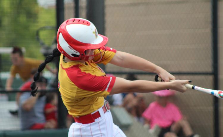Dale's Karsen Griggs hits a single in the third inning of the Class 2A State Fastpitch Softball Quarterfinals on Oct. 5, held at FireLake Ball Fields. The Lady Pirates beat Wyandotte, 5-2. Countywide & Sun/Natasha Dunagan