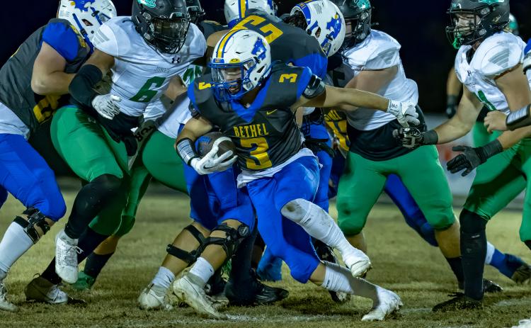 Bethel senior Brady Lower breaks away from the pack to run the ball during the Senior Night home game on Nov. 3. Bethel lost to Jones, 7-63. Photos provided by Richelle Treece.