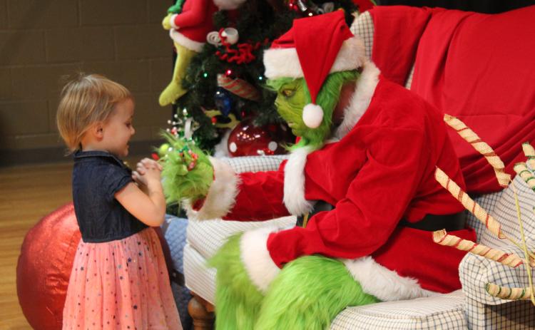 Pictures with the Grinch in Dec. 2022. File photo