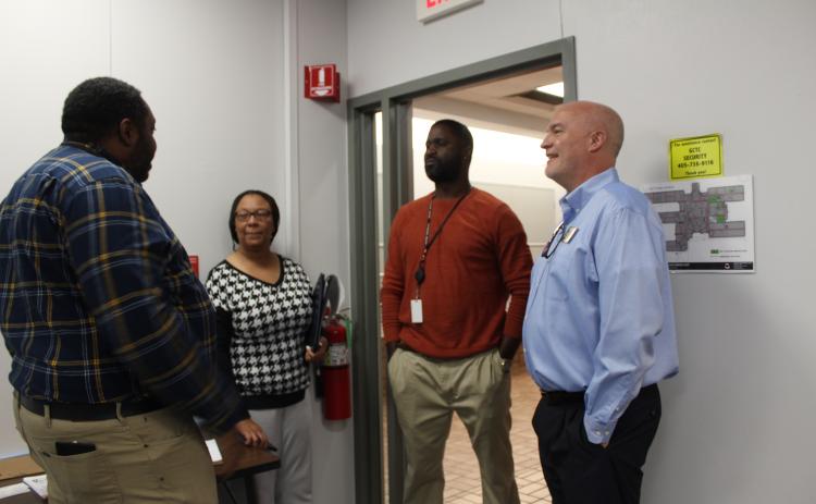 Maurice “Mo” Miller, Sharon Caldwell, Miguel Stewart and Dru Tischer have a conversation during the Oklahoma Employment Security Commission Veterans/Community Job Club on Nov. 2 at Gordon Cooper Technology Center. Countywide & Sun/Natasha Dunagan