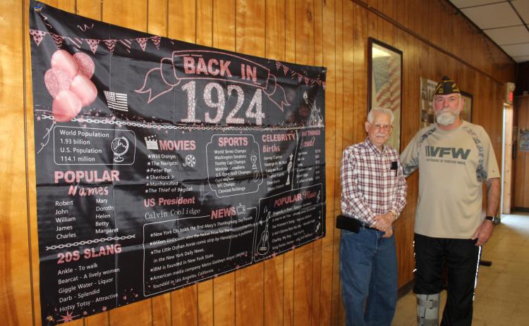Noah "Sonny" Hines was born on Feb. 1, 1924 and celebrated his 100th birthday at the Veterans of Foreign Wars Post 1317 on Feb. 5. Here, Hines poses with a "Back in 1924" banner and Post Commander Patrick Koch. Countywide & Sun/Natasha Dunagan