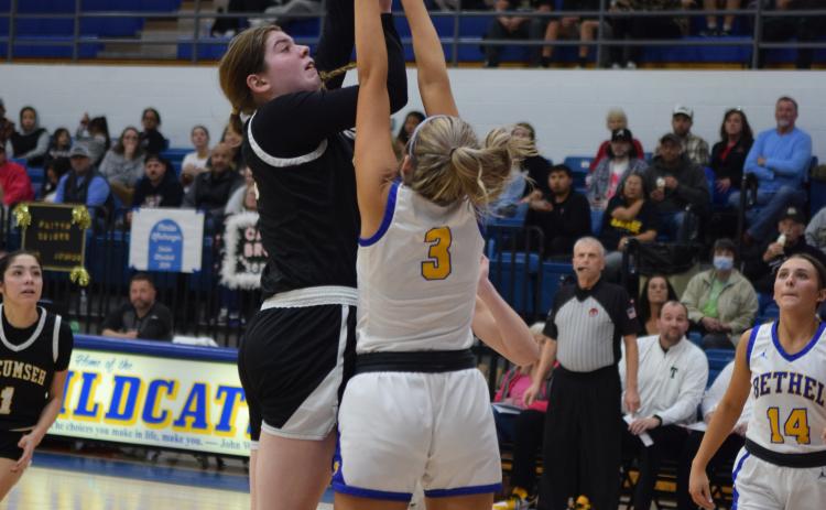 Tecumseh's Reagan Berry shoots for two to close the gap in the game against Bethel on Feb. 2nd.  The Savages fought back for the win 46-43. Countywide & Sun/Julie Talton