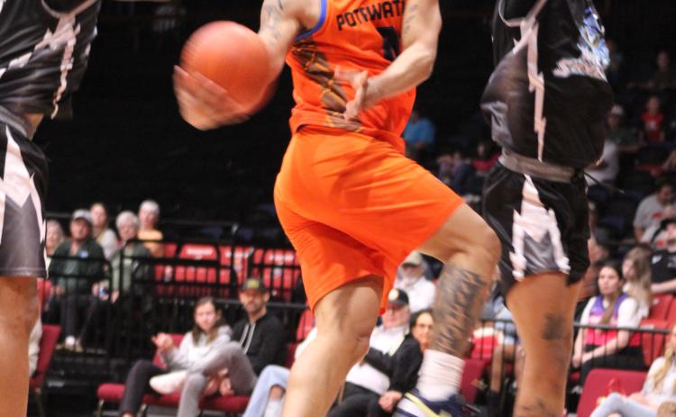 Potawatomi Fire point guard Deshawn Munson tries for a one-handed slam dunk in the fourth quarter of the home game with the Wichita Sky Kings on March 15. The Fire won, 148-125. Countywide & Sun/Natasha Dunagan