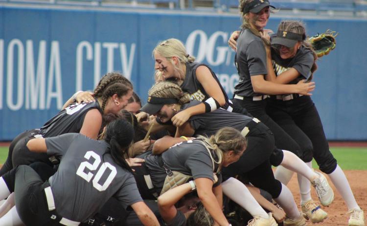 The Tecumseh Lady Savages dogpile after winning the Class 5A State Slow Pitch Softball State Championship. All on April 30, they won the Quarterfinals with Bristow, 14-10; the Semifinals with North Rock Creek, 13-7; and the Finals with Washington, 9-6. See more photos in the next issue. Countywide & Sun/Natasha Dunagan